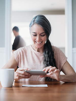 woman looking at her phone