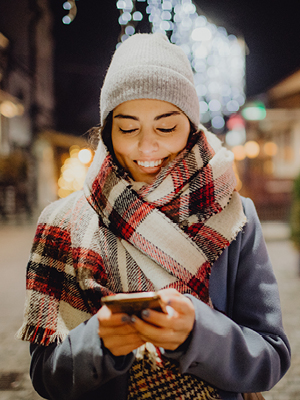 woman looking at her phone