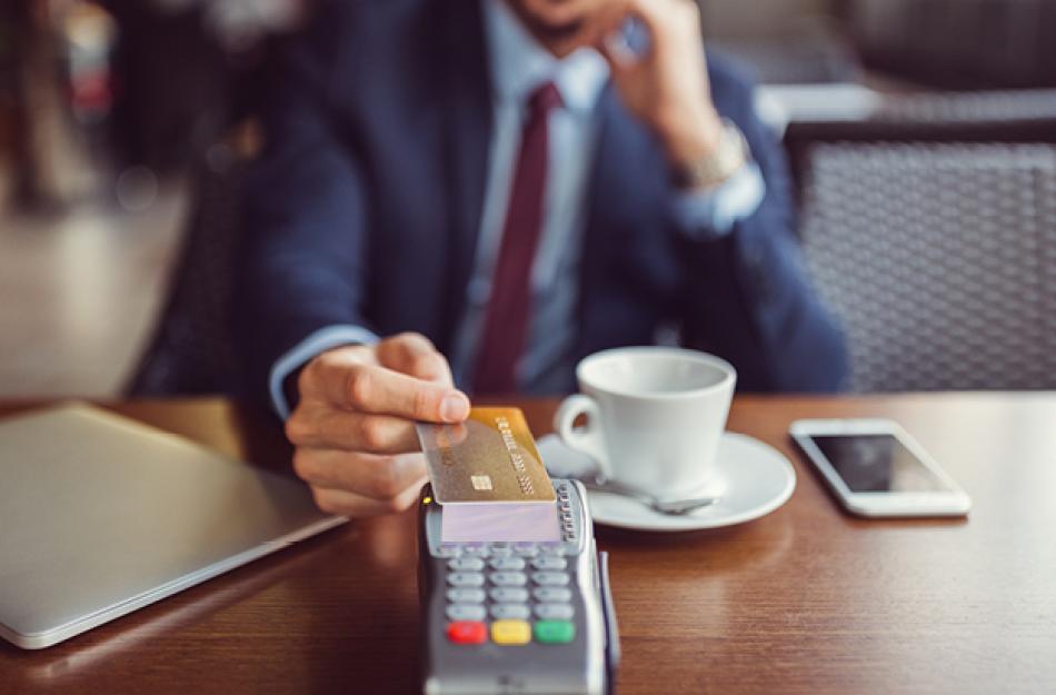 Man using a debit card