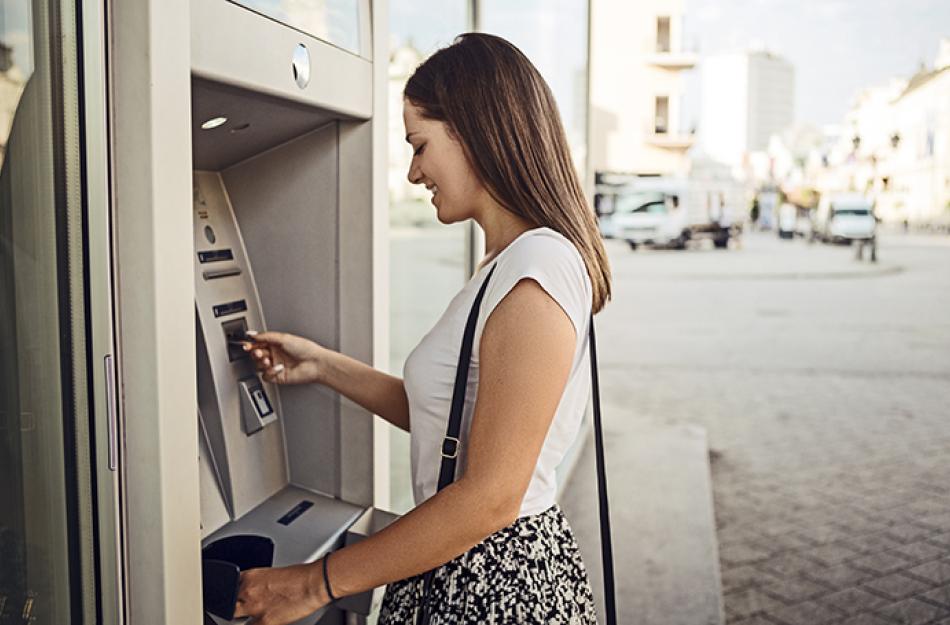 picture of a woman using the ATM